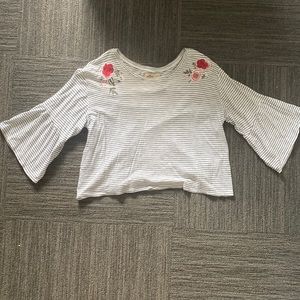 Flowy, embroidered flower top.